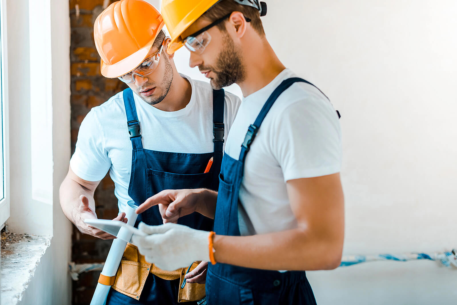 Contractors Working on a House