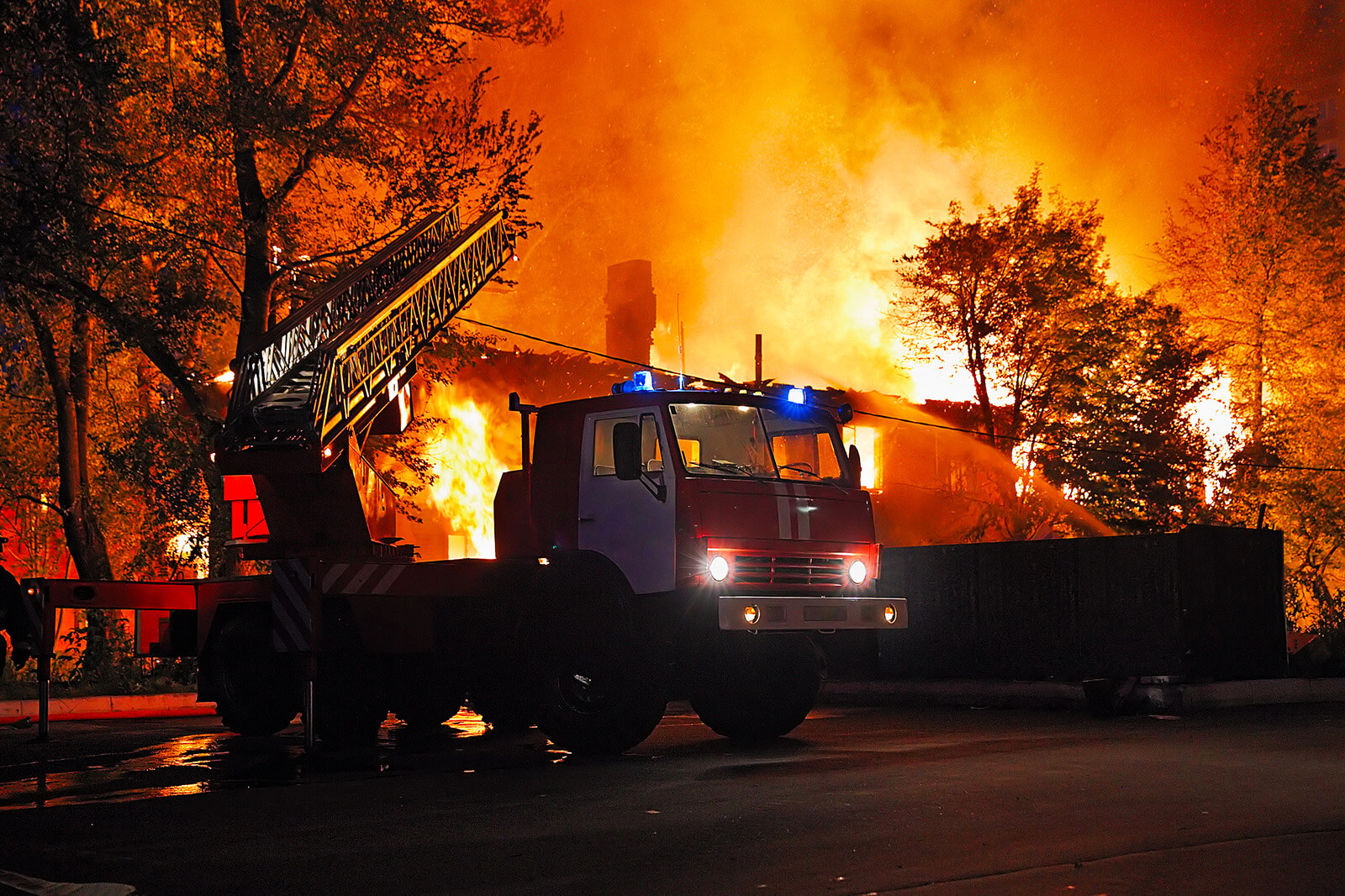 Firefighters Putting Out a House Fire