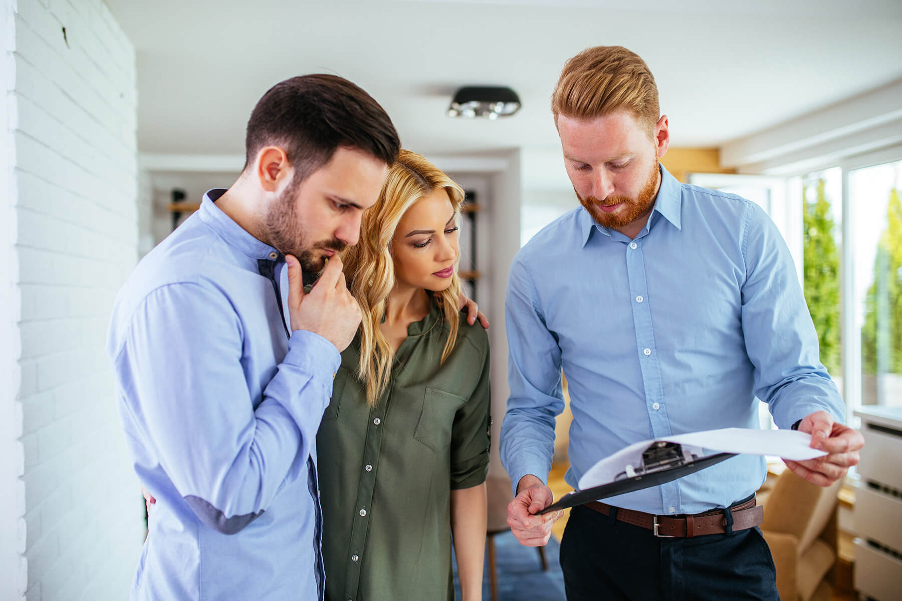 Homeowners Meeting With Insurance Company's Adjuster